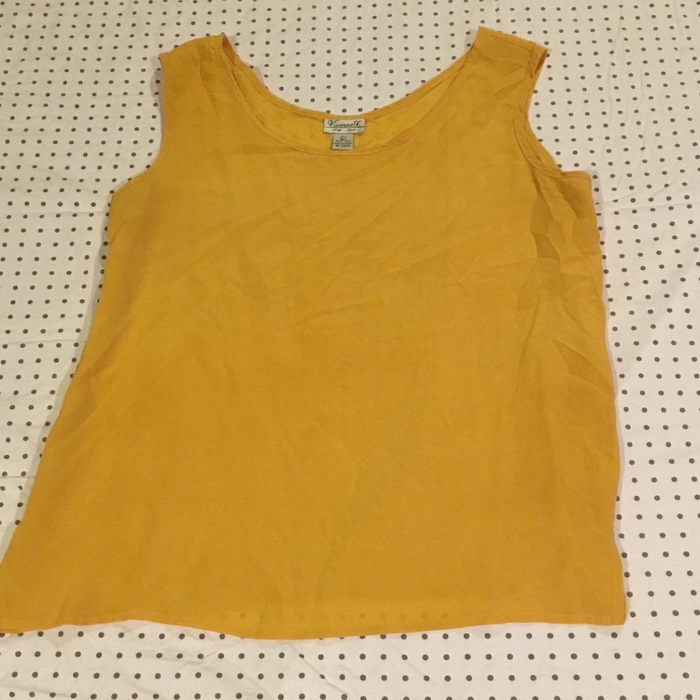 Yellow sleeveless blouse